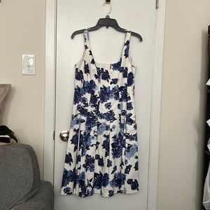 Cute summer dress. Just below the knee. Blue and white flowers